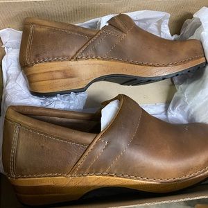 Brown leather clogs